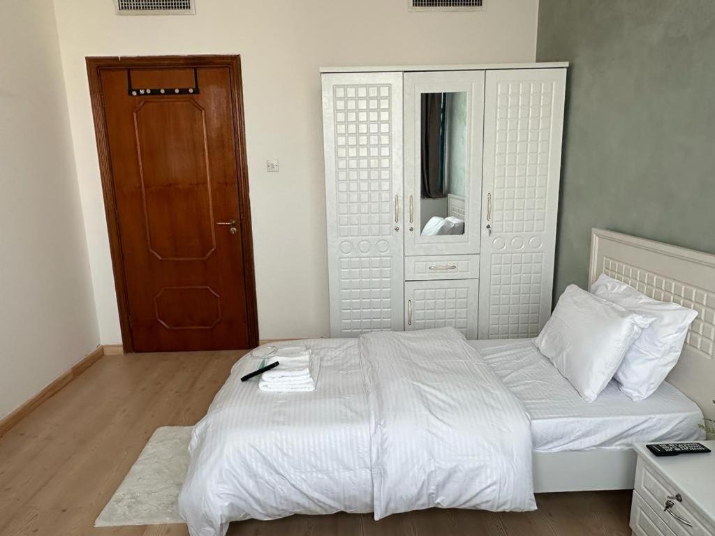 Two Single Beds Bedroom In The Heart Of The Abu Dhabi